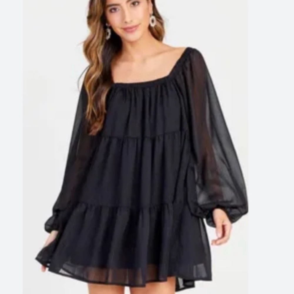 Black puffy mini dress.